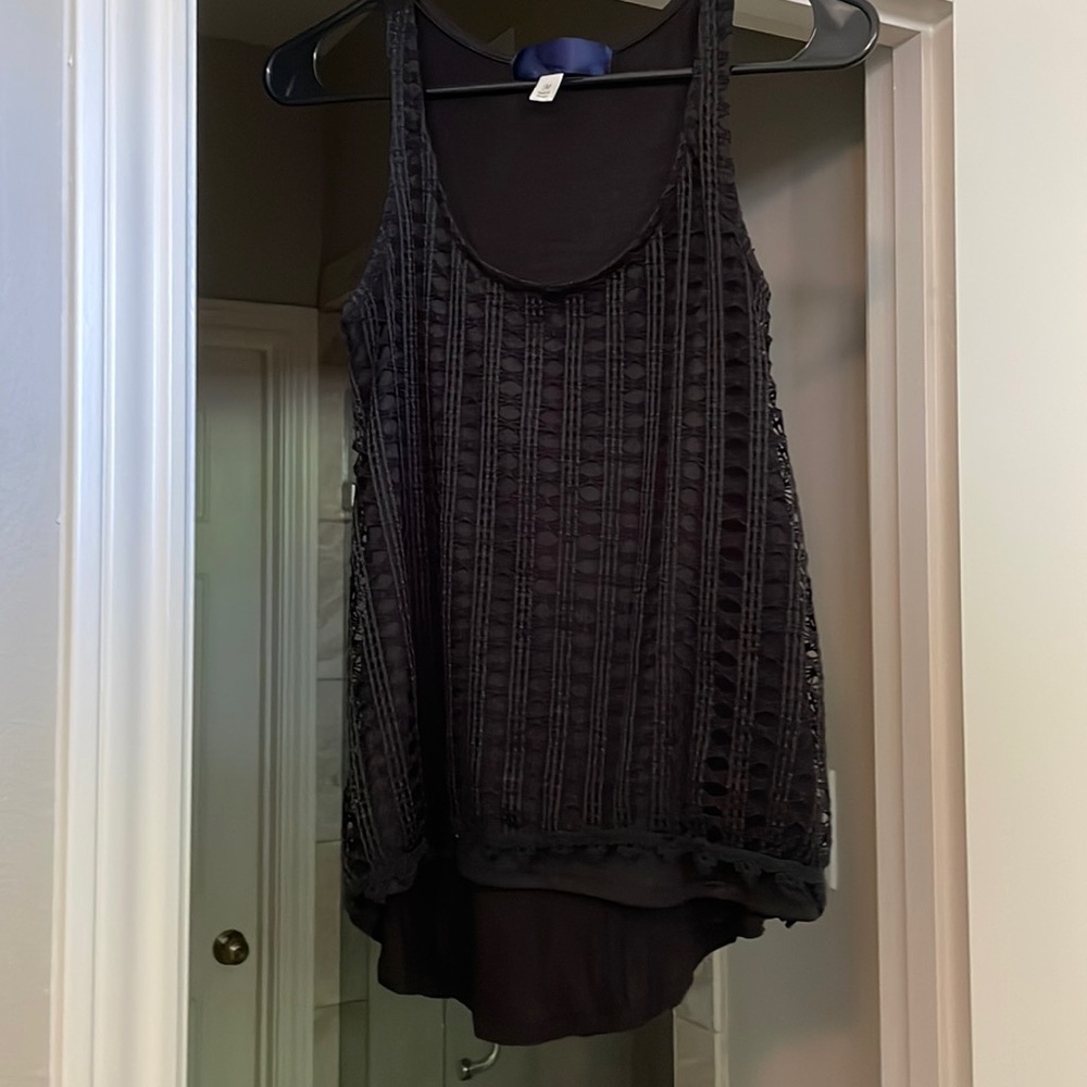 Black stitched shirt.